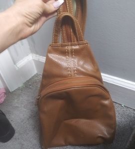 Brown leather backpack and wallet combo